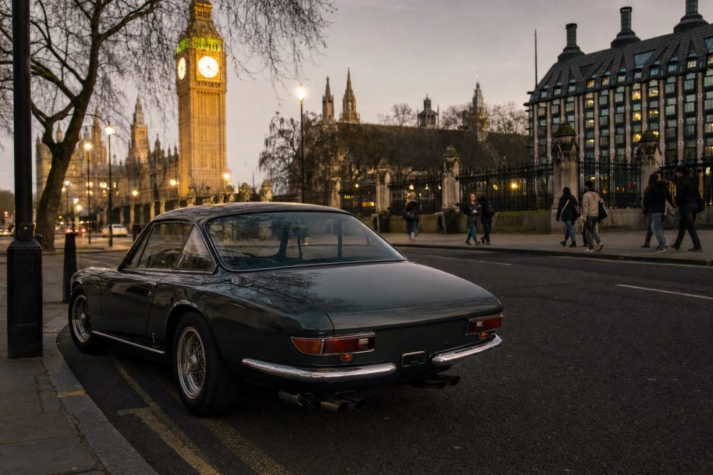 Vintage car on a London street at dusk