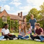 International students studying English outdoors at a British summer school