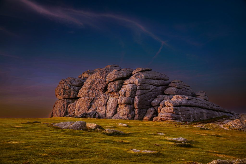 Haytor on Dartmoor at sunset, a popular day trip from Exeter