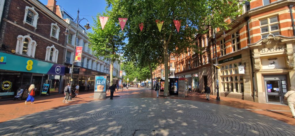 Broad Street in Reading with shops and pedestrians