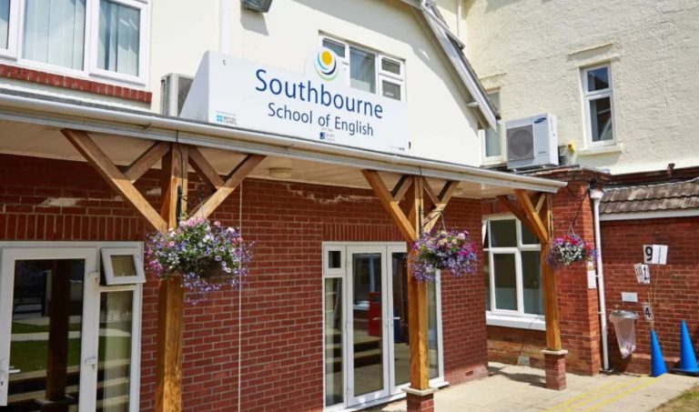 Front entrance of Southbourne School of English with hanging baskets