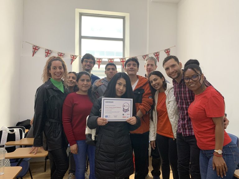 Time4London class celebrating a student certificate